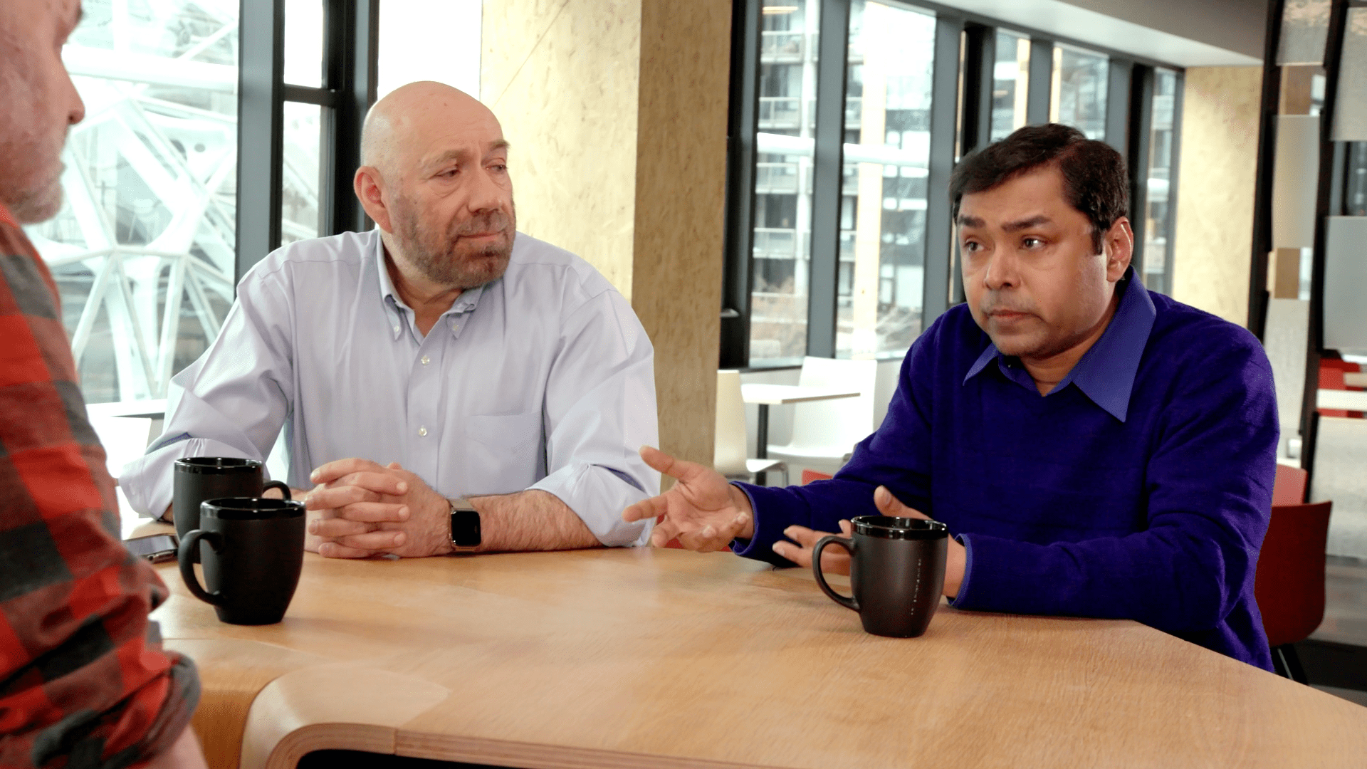 Werner, Sudipta, and Dan behind the scenes