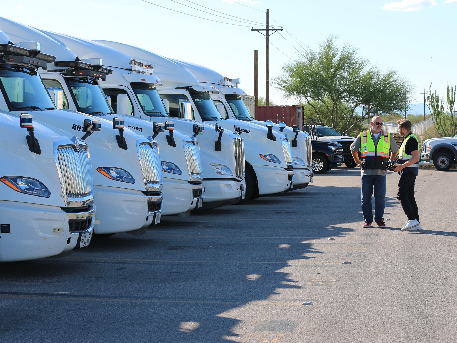 Werner in front of autonomous trucks